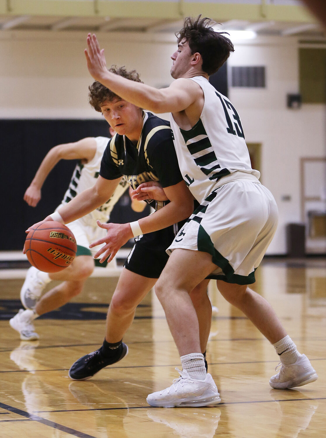 Calvin Rule pushes through Billings Central senior Nate Sasich
